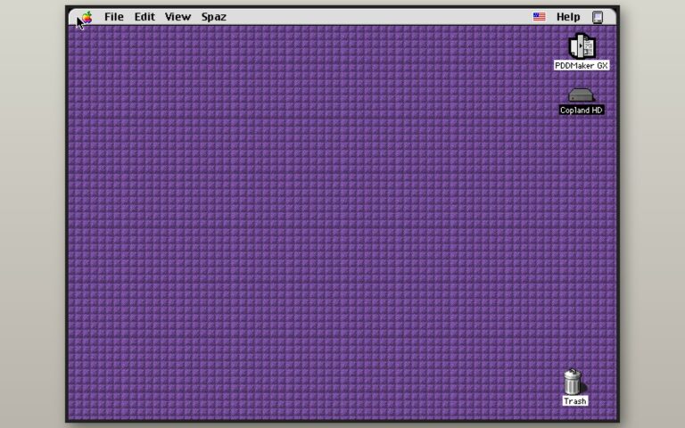 Bureau violet de Copland D11E4, la préversion de Mac OS de juin 1996, avec sa barre de menus et l'icône du disque Copland HD